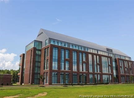 Suggs Road Dunn, NC 28334 - Photo 3 of 9 a view of a building with a big yard