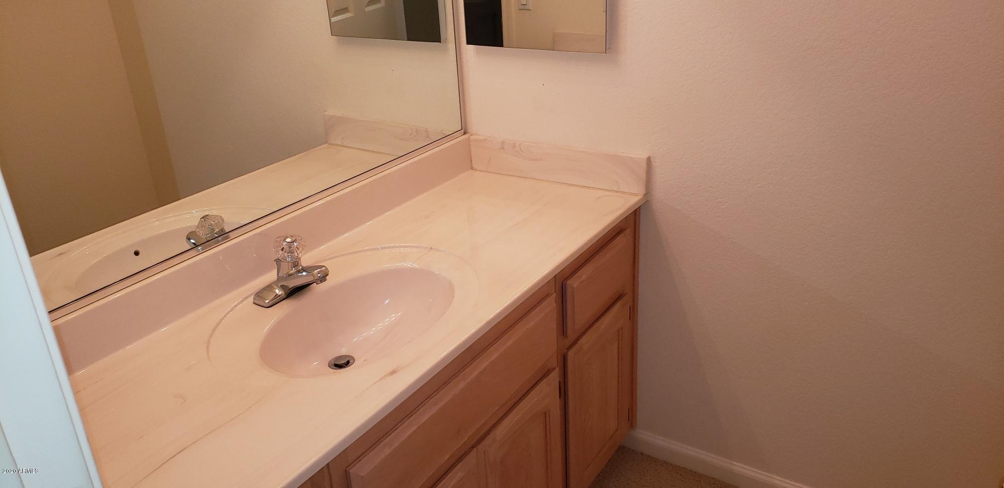 15471 Piccadilly Road Goodyear, AZ 85395 - Photo 16 of 33 full bath downstairs