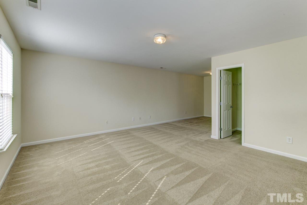 3620 Pinkham Way Raleigh, NC 27616 - Photo 13 of 25 an empty room with windows