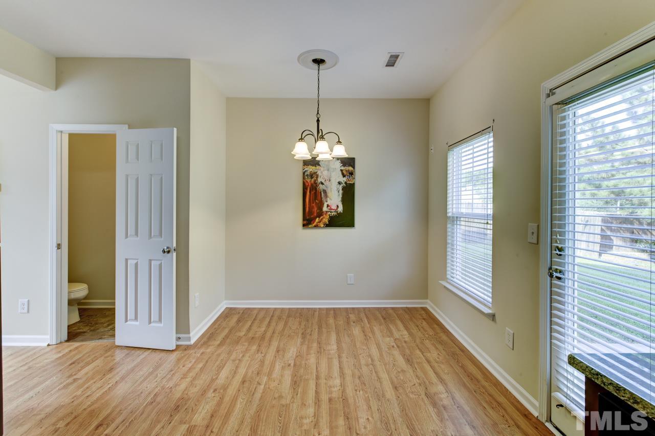 3620 Pinkham Way Raleigh, NC 27616 - Photo 4 of 25 a view of a room with wooden floor and window