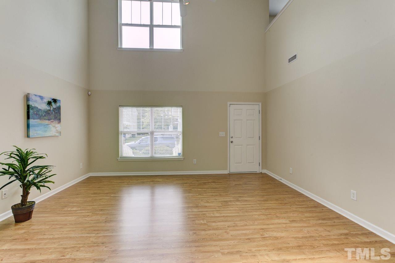 3620 Pinkham Way Raleigh, NC 27616 - Photo 6 of 25 a view of an empty room and window