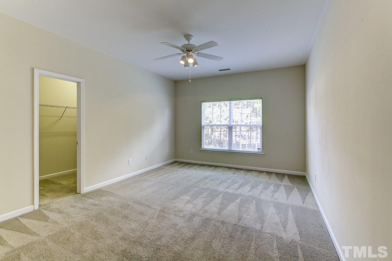 3620 Pinkham Way Raleigh, NC 27616 - Photo 7 of 25 a view of an empty room with a window