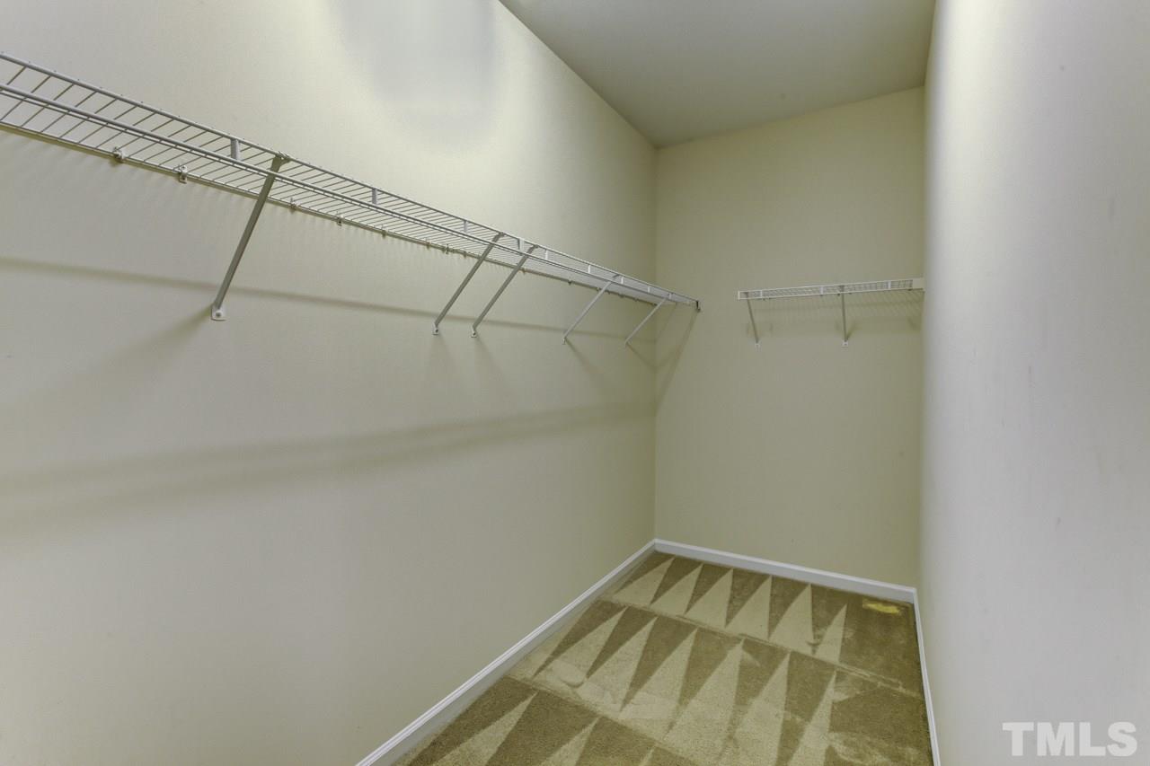 3620 Pinkham Way Raleigh, NC 27616 - Photo 9 of 25 a view of a room with racks on the wall