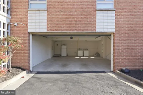 a view of backyard and a garage