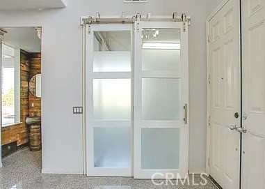 12683 Palm View Way Riverside, CA 92503 - Photo 15 of 25 a bathroom with a glass shower door