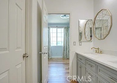 12683 Palm View Way Riverside, CA 92503 - Photo 19 of 25 a bathroom with a sink and a mirror