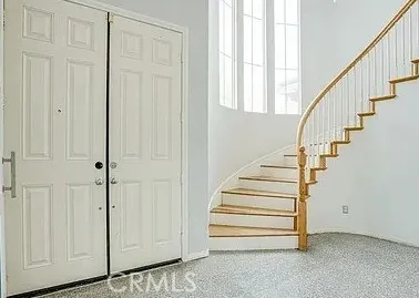 a view of entryway with stairs