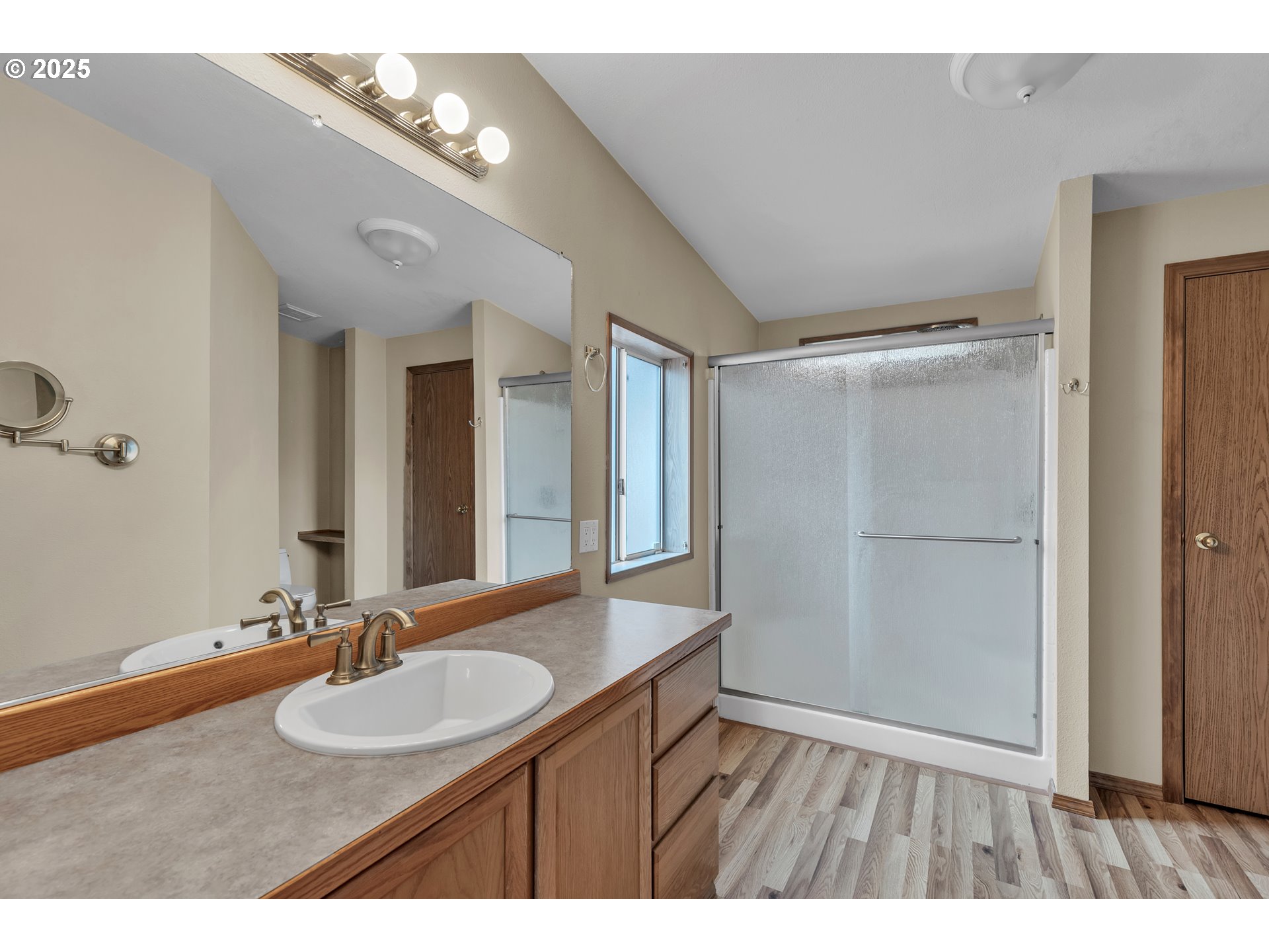 5701 Northeast St Johns Road, Unit 4 Vancouver, WA 98661 - Photo 12 of 28 a bathroom with a sink and a mirror