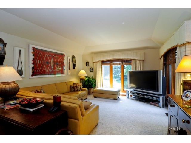 1507 Appleby Road Inverness, IL 60067 - Photo 12 of 25 a living room with furniture and a flat screen tv