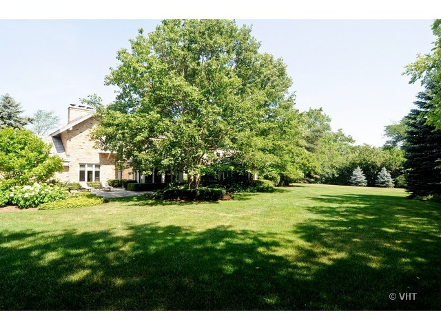 1507 Appleby Road Inverness, IL 60067 - Photo 25 of 25 a view of a grassy field with trees