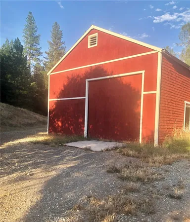 a view of a yard with a mountain