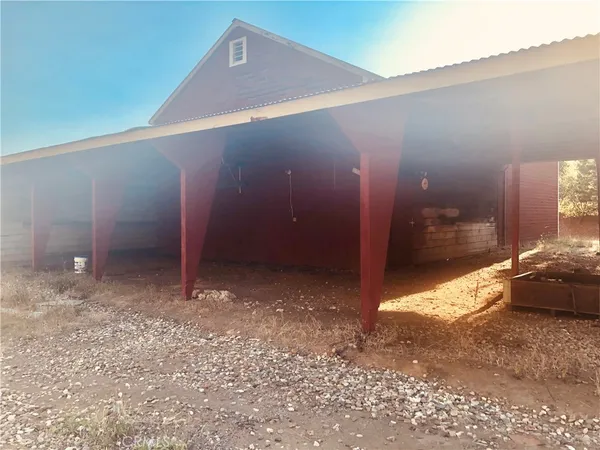 a view of a water with palm trees