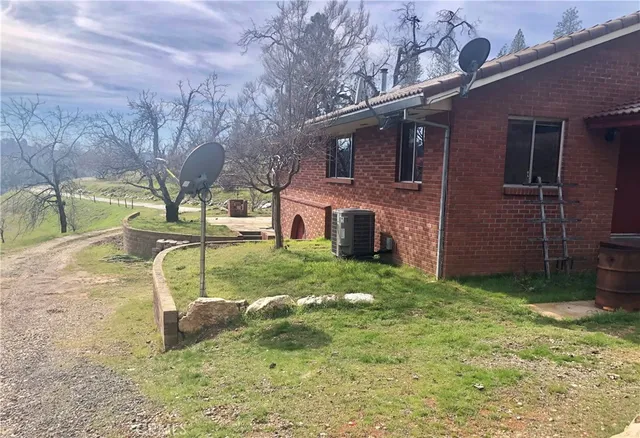 a view of a house with a street
