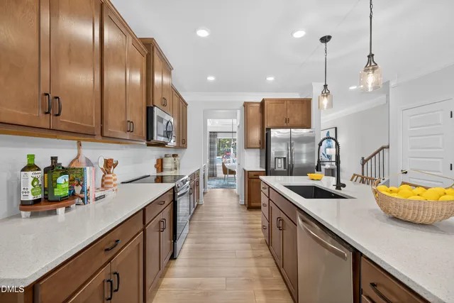 a kitchen with lots of counter space and window