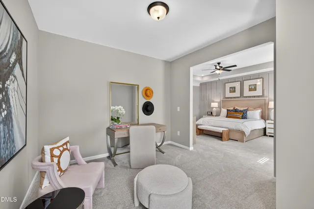 a bedroom with furniture and a window