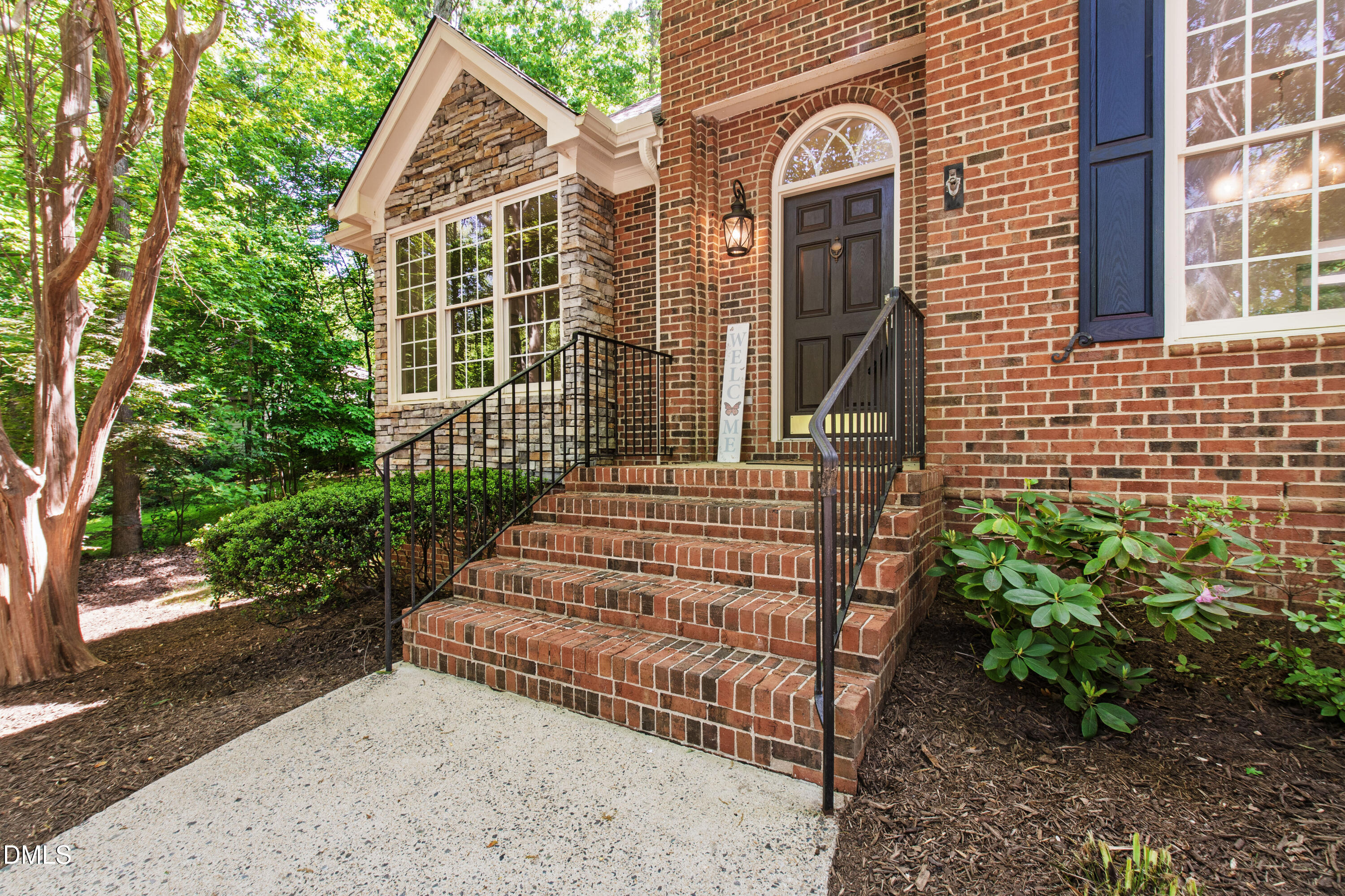 2721 Glassman Lane Raleigh, NC 27606 - Photo 10 of 74 a view of a brick house with a large windows