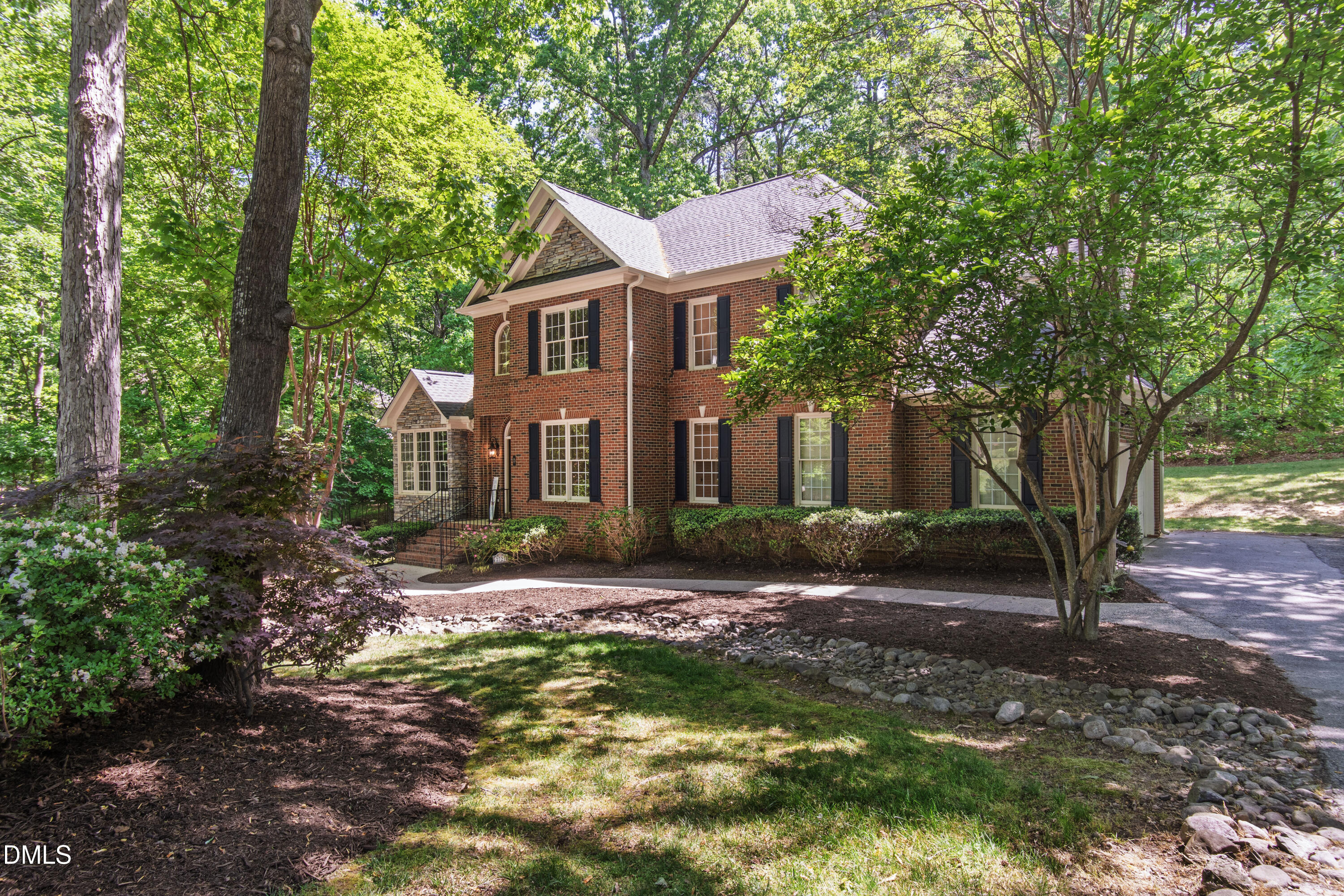2721 Glassman Lane Raleigh, NC 27606 - Photo 11 of 74 a front view of a house with yard and green space