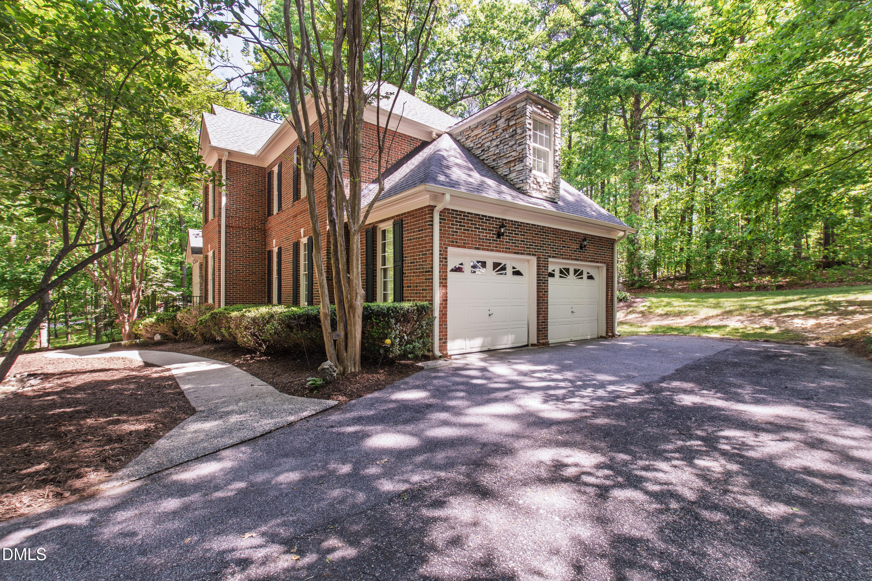 2721 Glassman Lane Raleigh, NC 27606 - Photo 12 of 74 a view of a house with backyard and trees