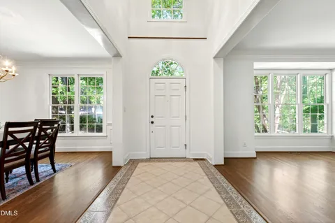 a kitchen with stainless steel appliances granite countertop a sink a stove a microwave and cabinets