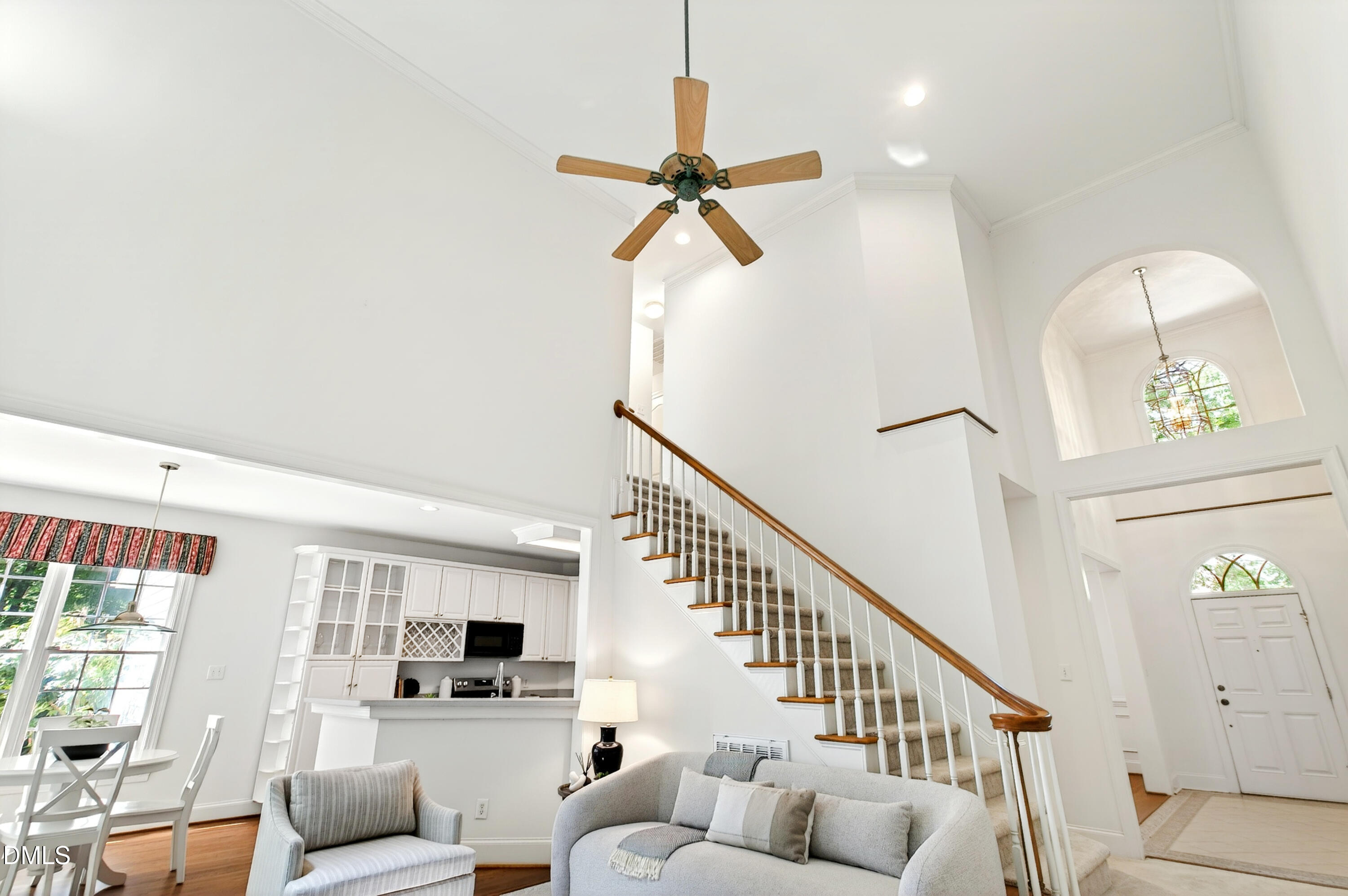 2721 Glassman Lane Raleigh, NC 27606 - Photo 24 of 74 a view of livingroom with furniture wooden floor and windows