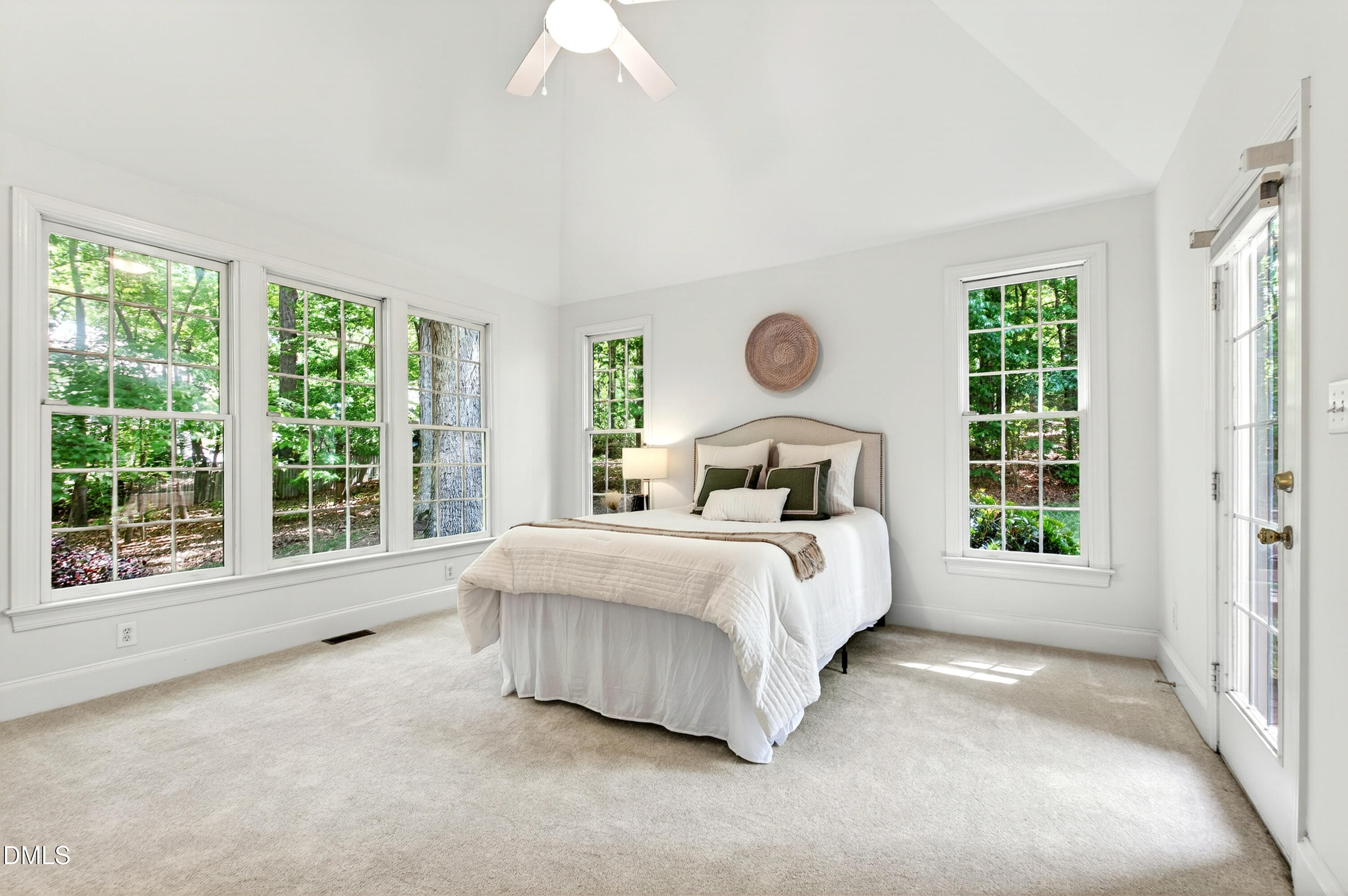 2721 Glassman Lane Raleigh, NC 27606 - Photo 37 of 74 a bedroom with a large bed and a window