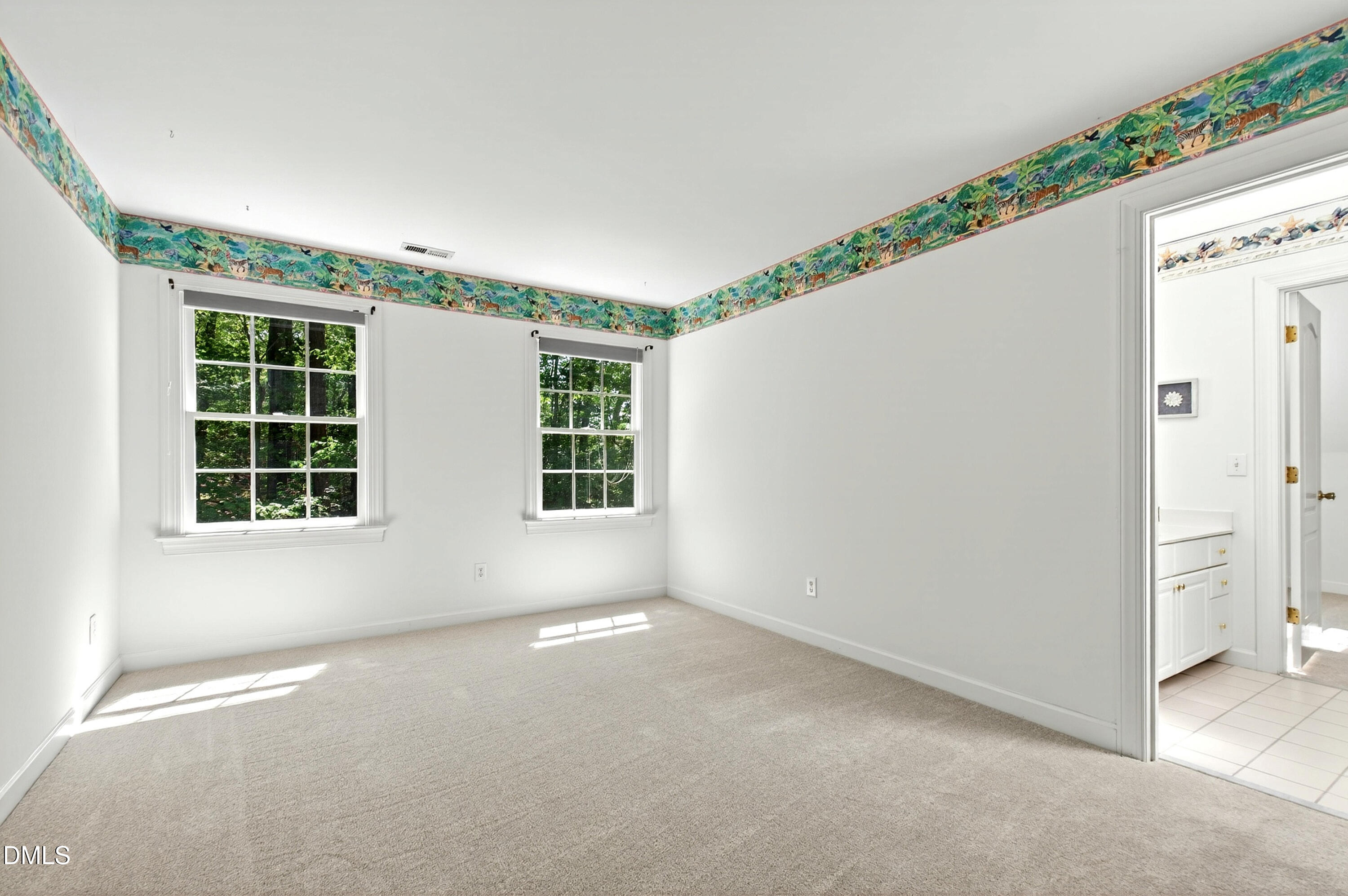 2721 Glassman Lane Raleigh, NC 27606 - Photo 44 of 74 an empty room with windows