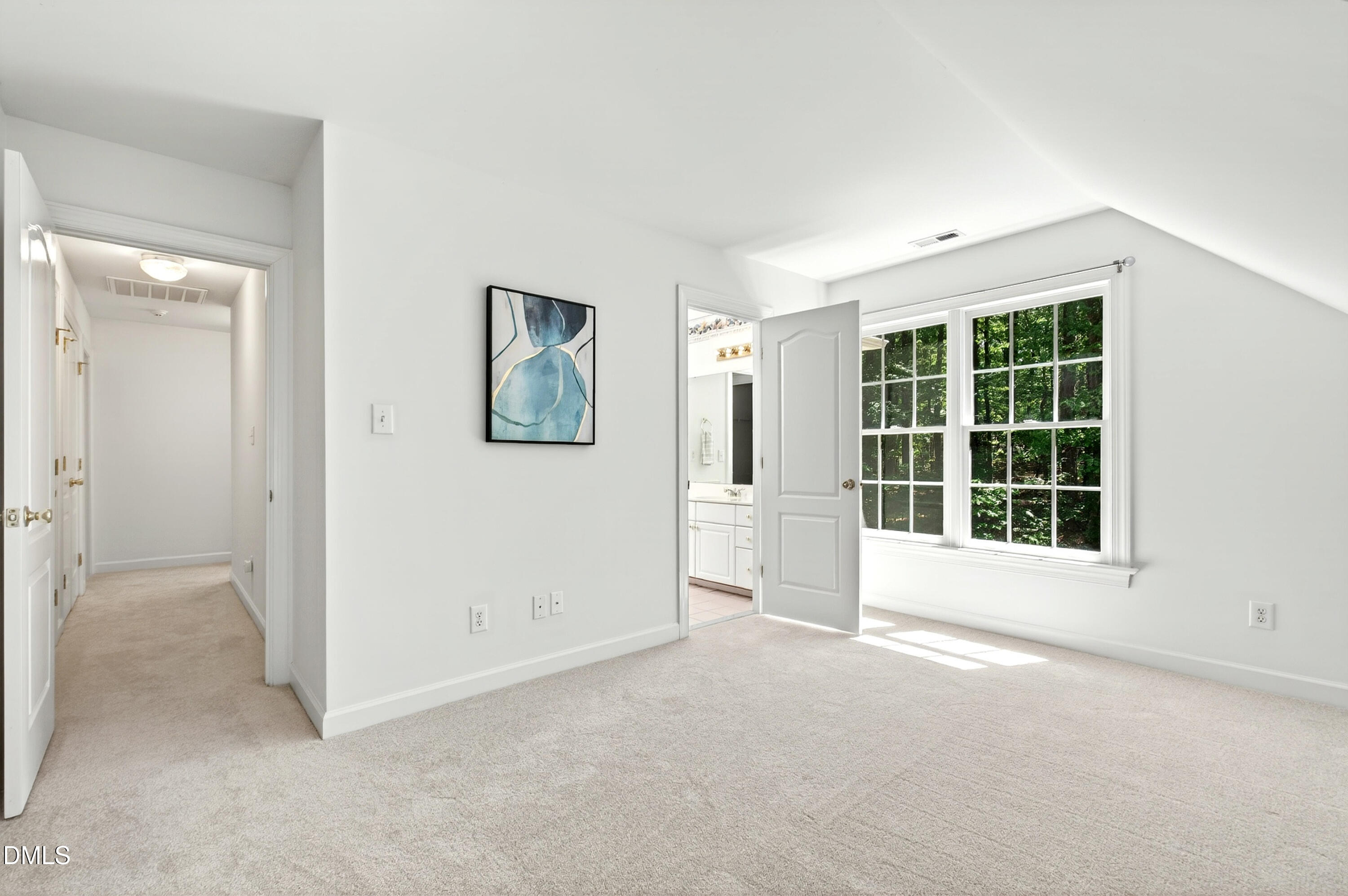 2721 Glassman Lane Raleigh, NC 27606 - Photo 50 of 74 an empty room with windows and closet
