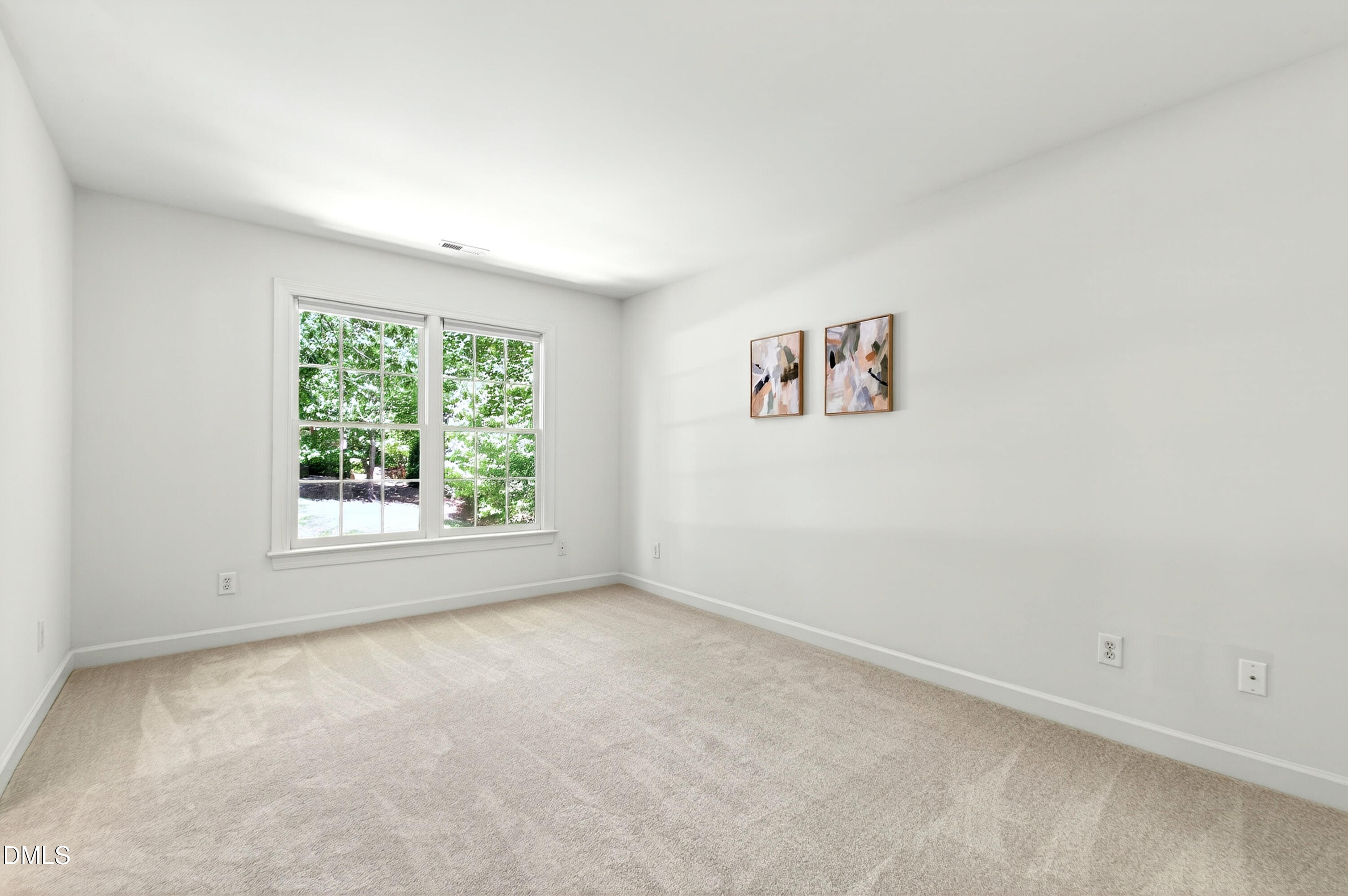 2721 Glassman Lane Raleigh, NC 27606 - Photo 54 of 74 an empty room with a window