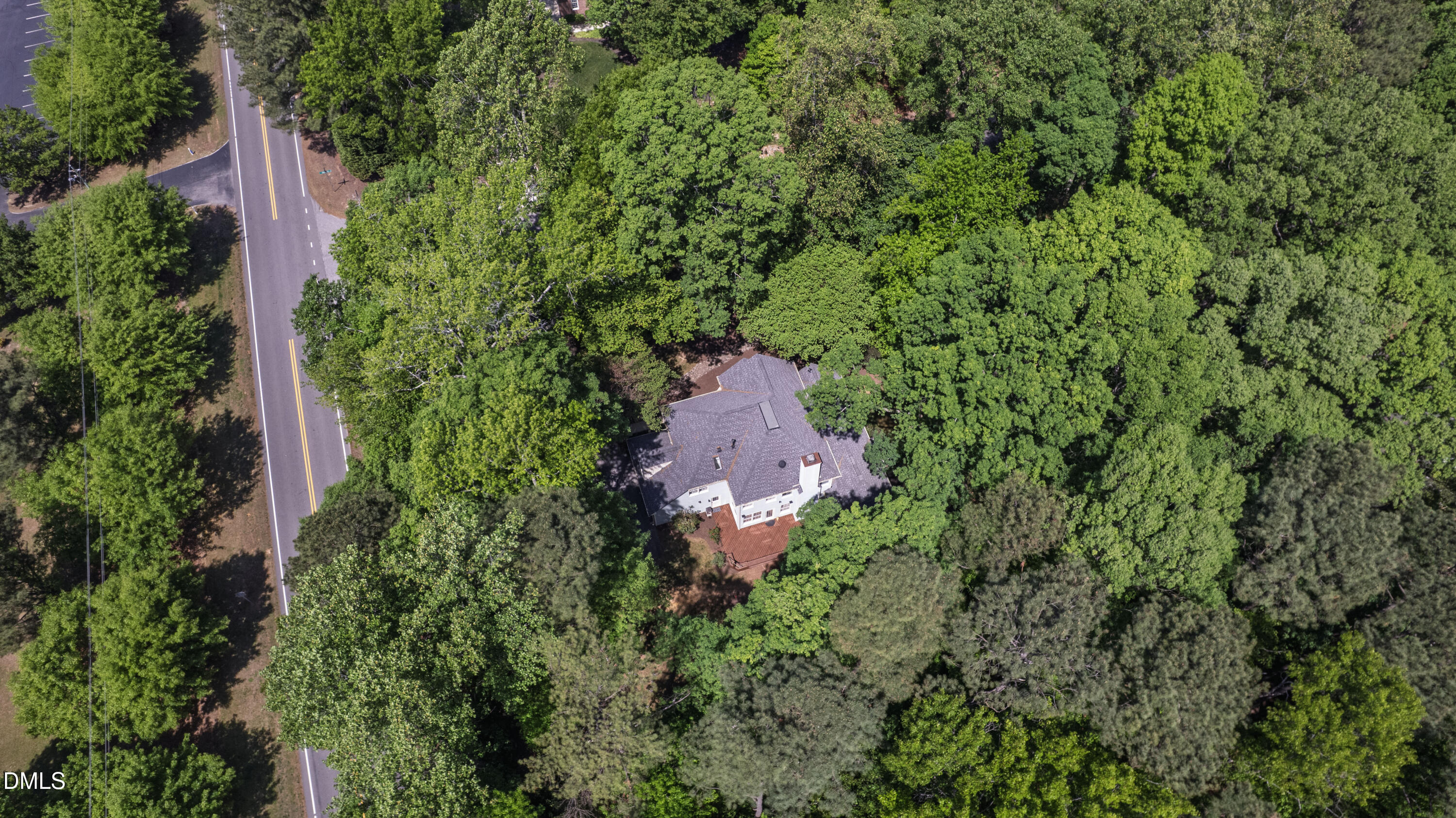 2721 Glassman Lane Raleigh, NC 27606 - Photo 66 of 74 an aerial view of residential house with outdoor space and trees all around