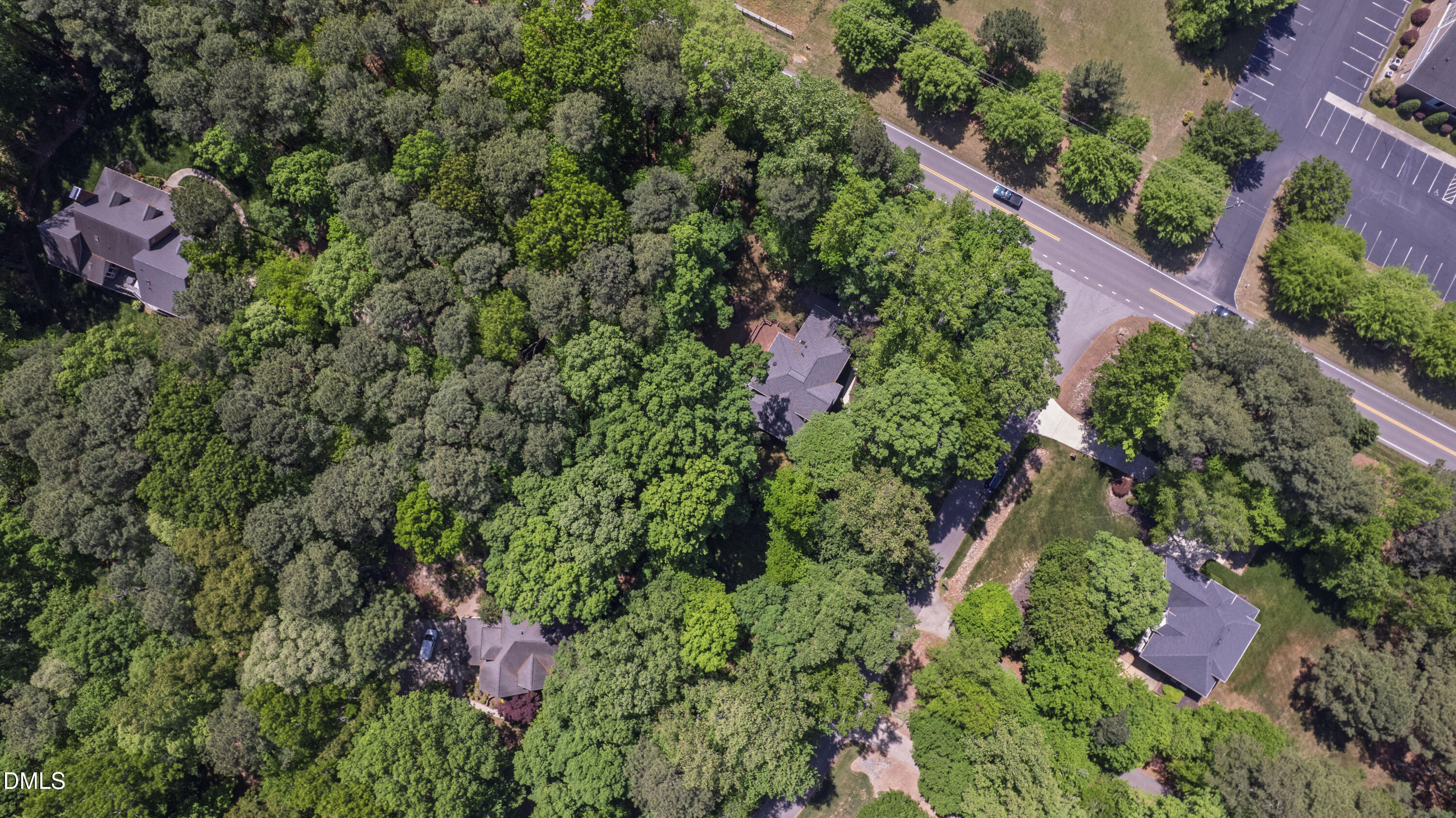 2721 Glassman Lane Raleigh, NC 27606 - Photo 72 of 74 an aerial view of a house with a yard