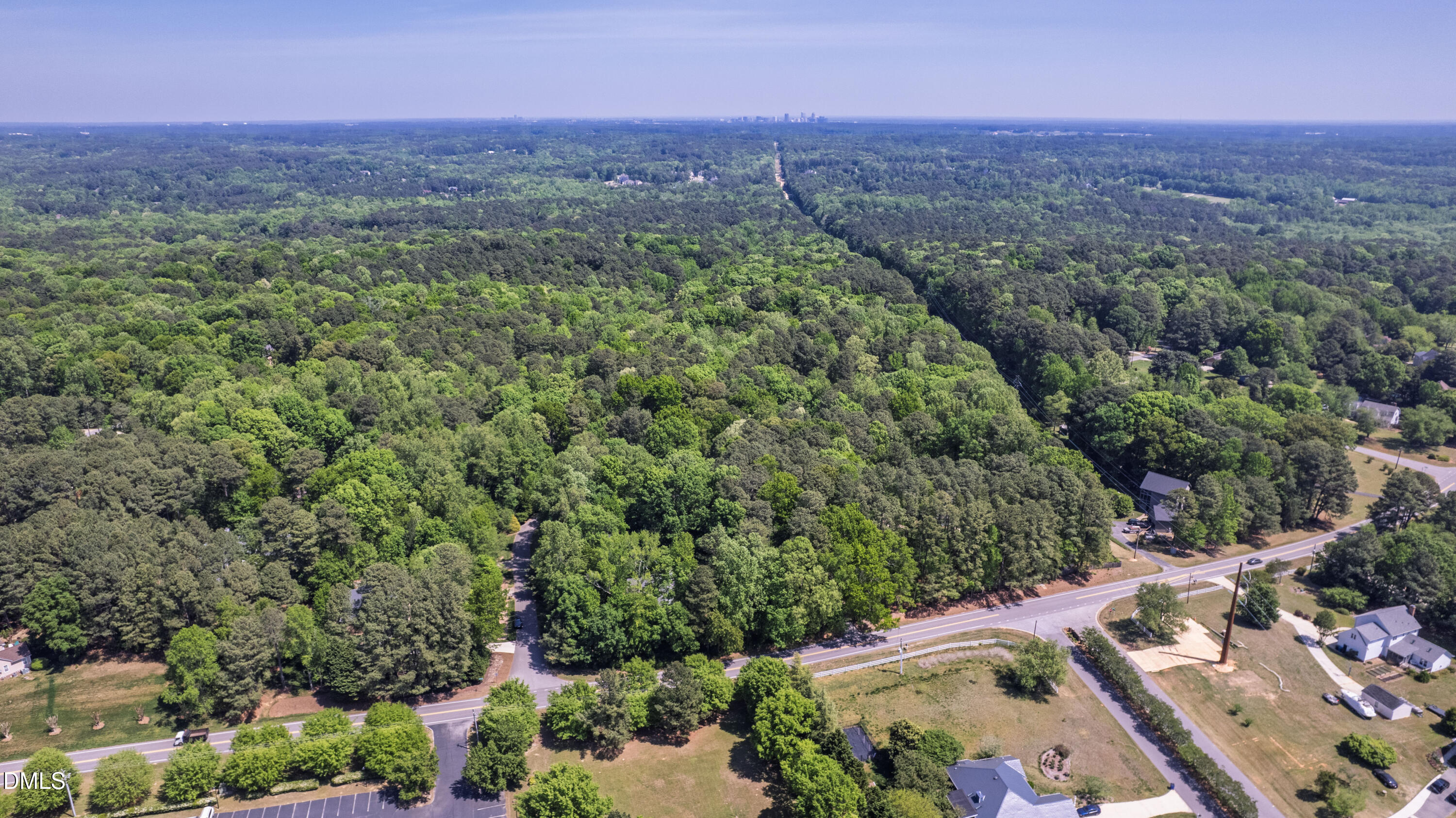 2721 Glassman Lane Raleigh, NC 27606 - Photo 73 of 74 an aerial view of a house with a yard