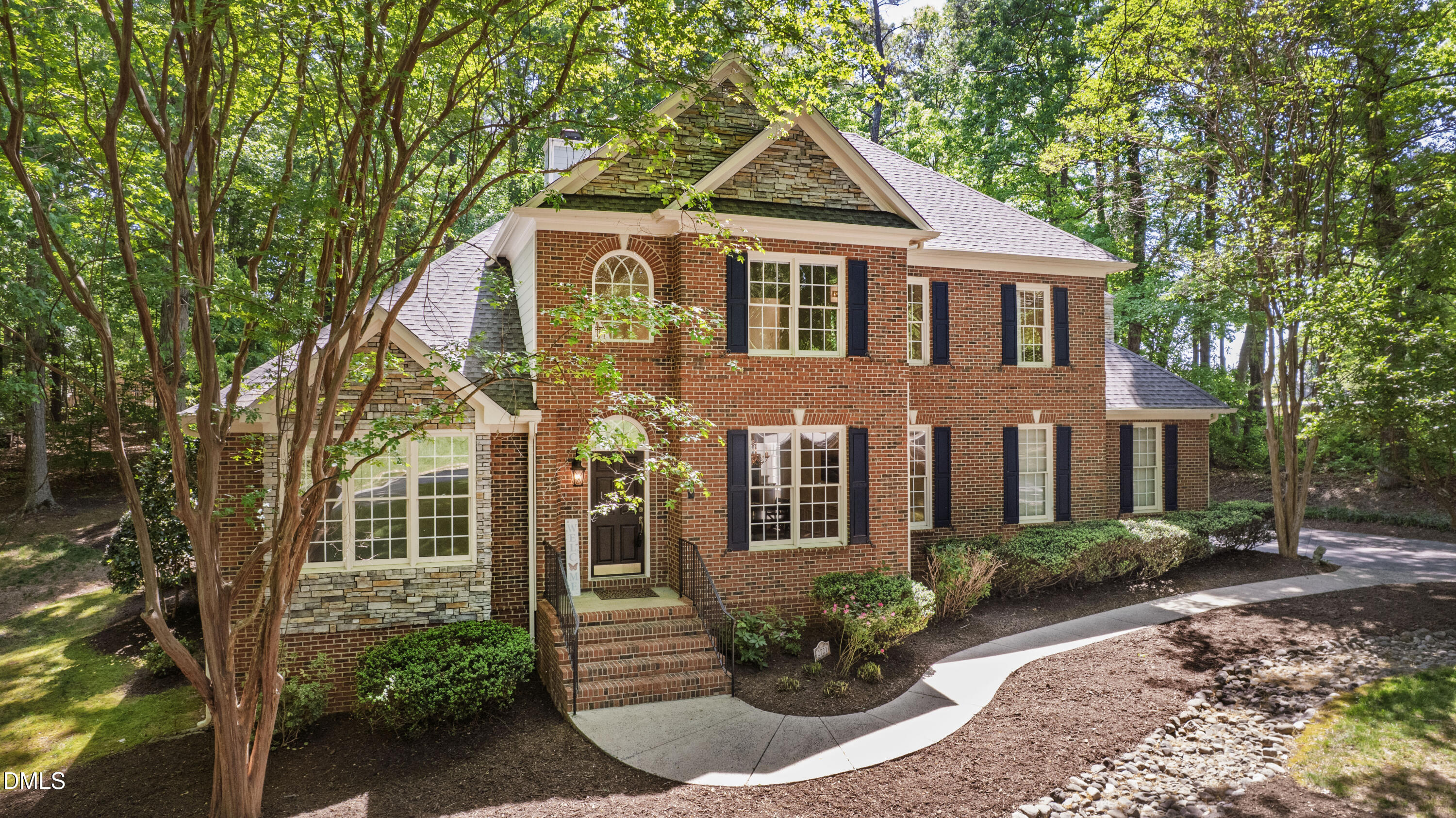 2721 Glassman Lane Raleigh, NC 27606 - Photo 8 of 74 a front view of a house with garden