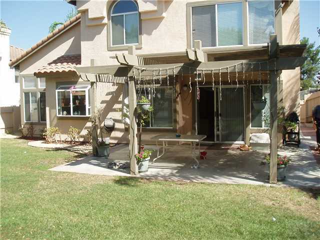 660 Montage Road Oceanside, CA 92057 - Photo 22 of 24 View of Back of Home showing Covered Patio
