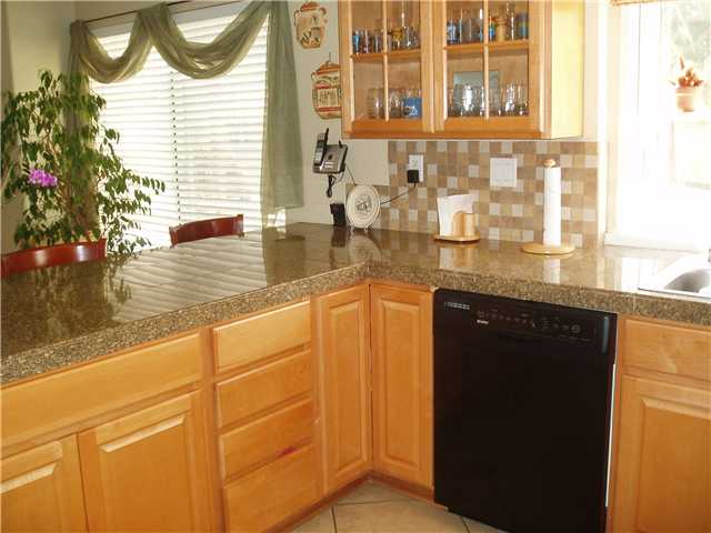 660 Montage Road Oceanside, CA 92057 - Photo 9 of 24 Kitchen with Birch Cabinets