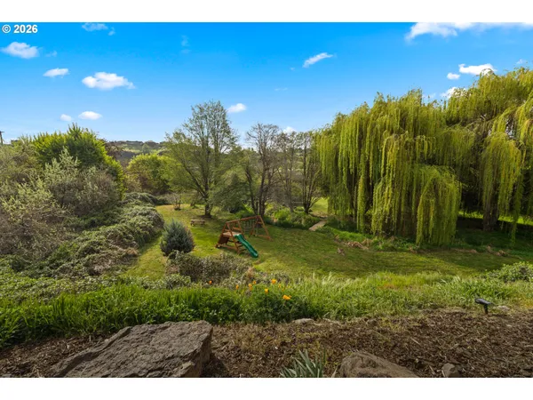 a view of an outdoor space and a yard