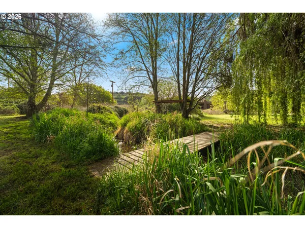 a view of backyard with green space