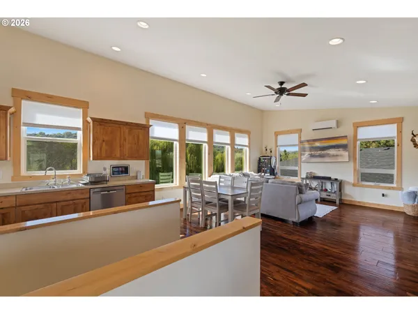 a kitchen with stainless steel appliances a stove sink and cabinets