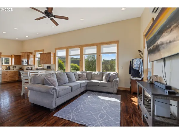 a kitchen with stainless steel appliances a refrigerator and a stove