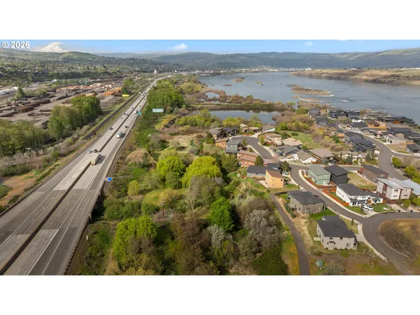 a view of a city with an ocean