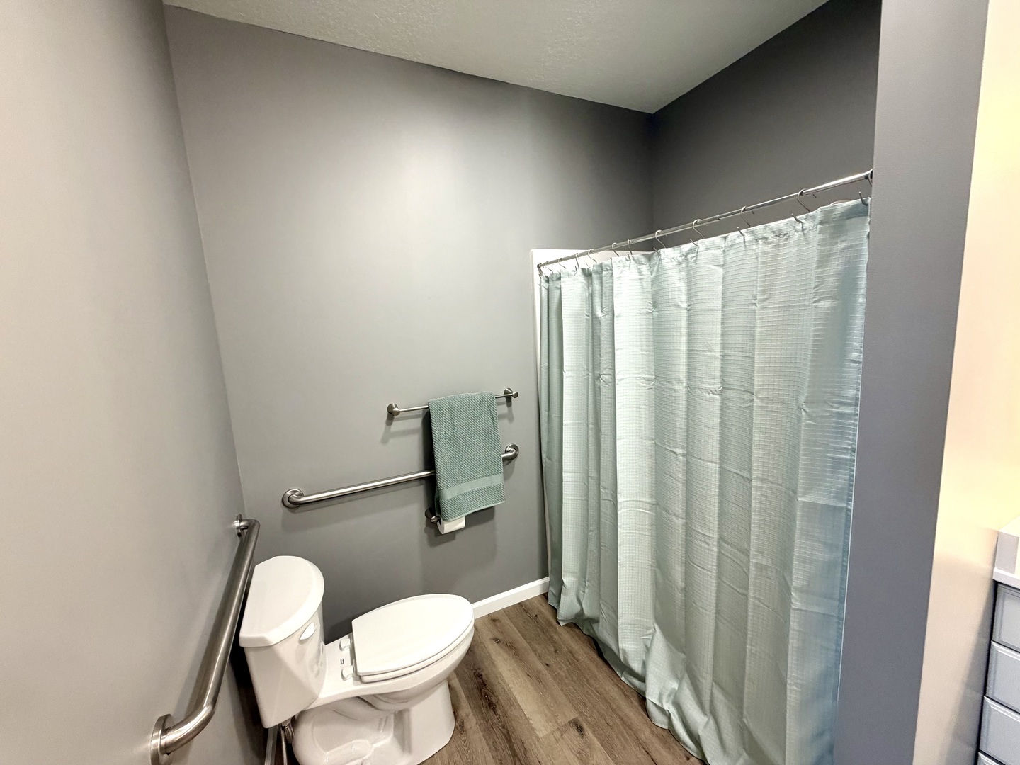 135 Countryview Court Aledo, IL 61231 - Photo 12 of 20 a white toilet sitting next to a bathroom sink