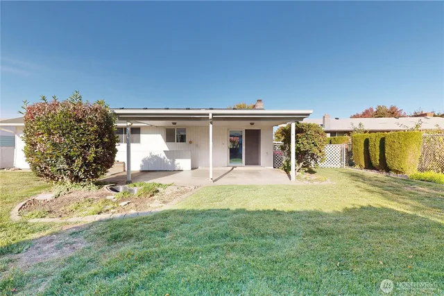 a view of a house with swimming pool