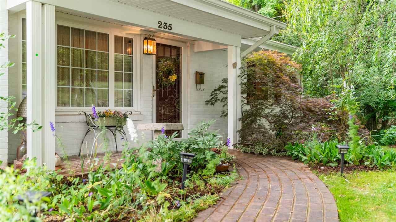 a front view of a house with a porch