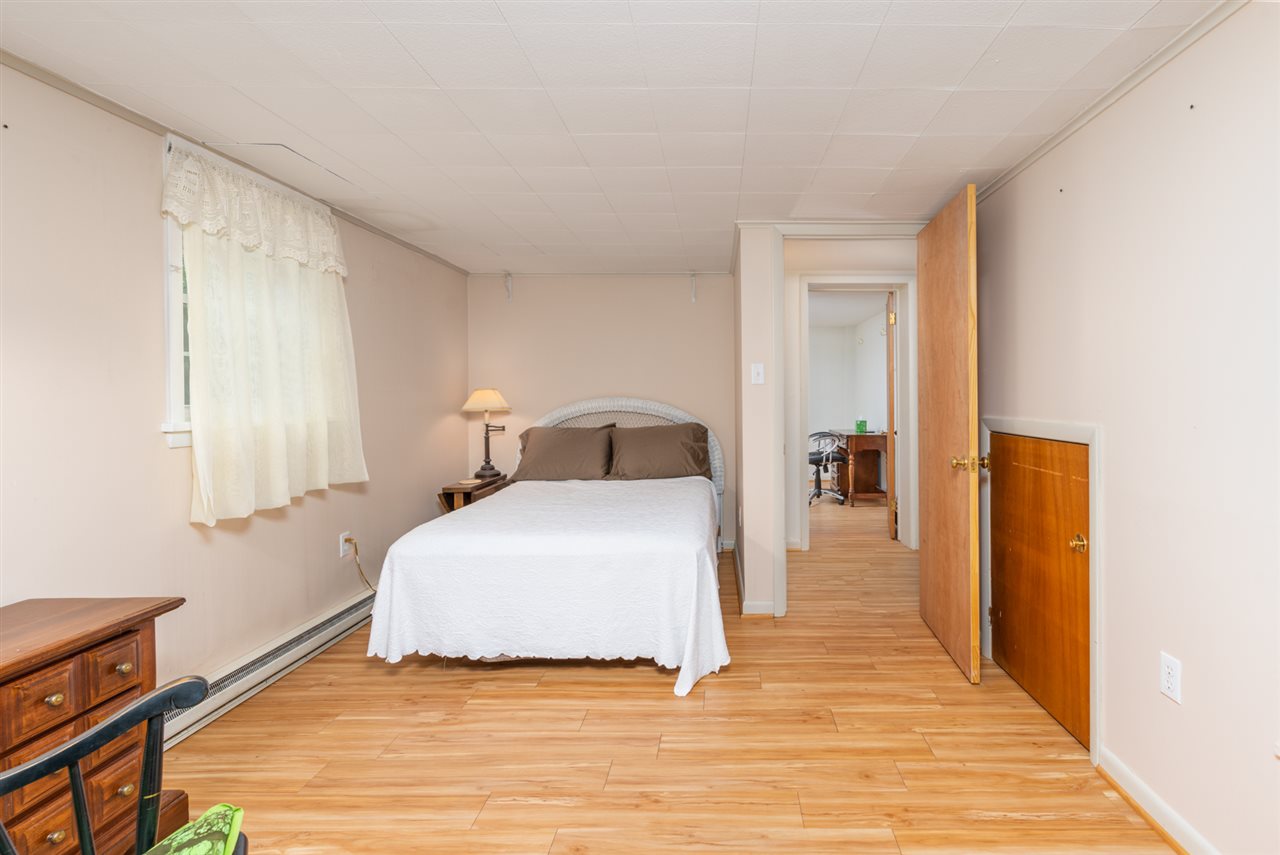 235 Overlook Road Staunton, VA 24401 - Photo 20 of 37 a bedroom with a bed and wooden floor