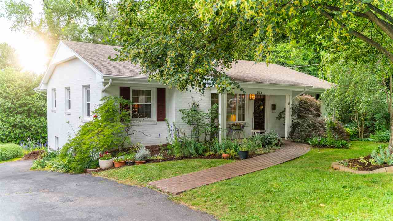 235 Overlook Road Staunton, VA 24401 - Photo 2 of 37 a view of a white house next to a yard and plants