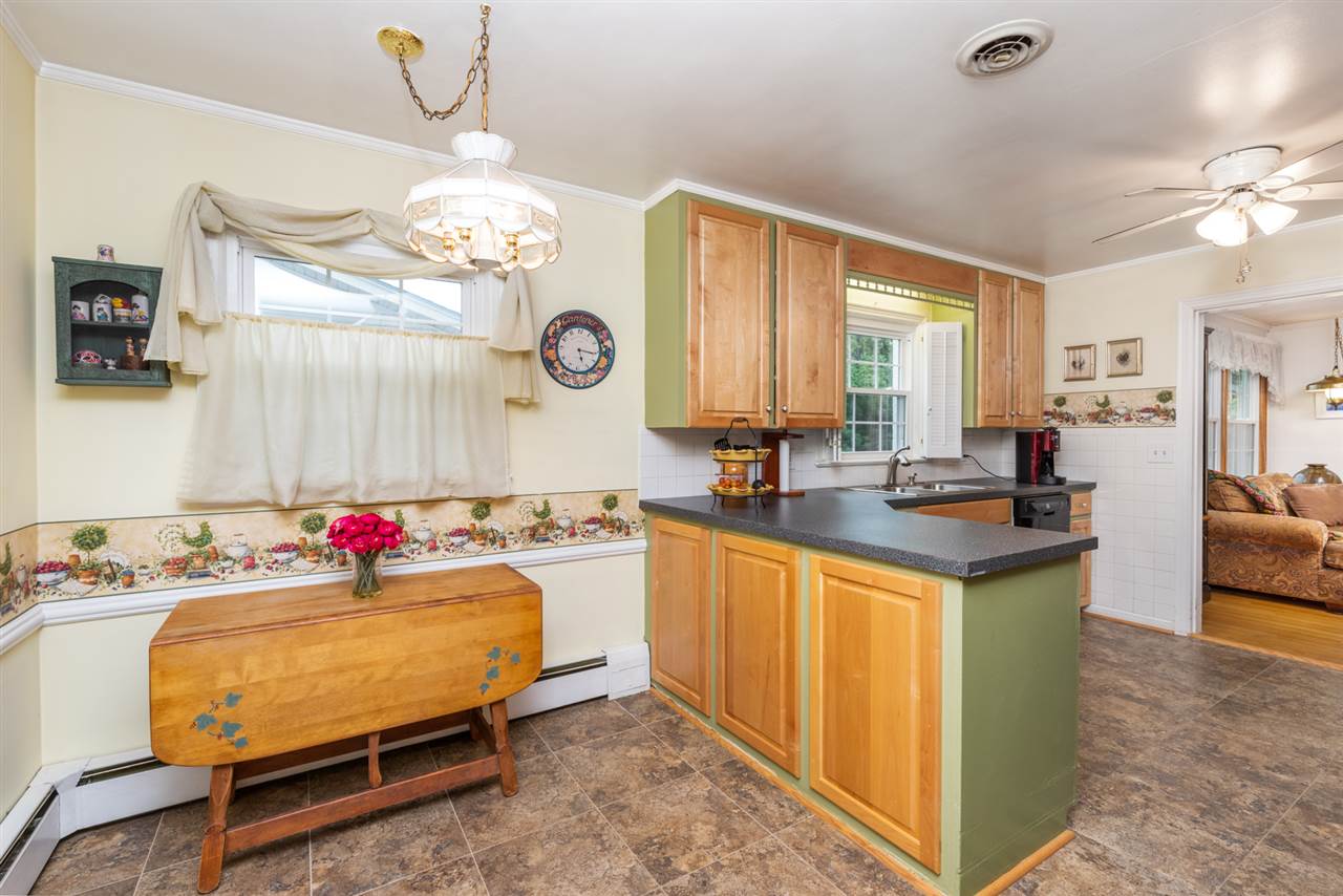 235 Overlook Road Staunton, VA 24401 - Photo 6 of 37 a bedroom with a bed and a chandelier