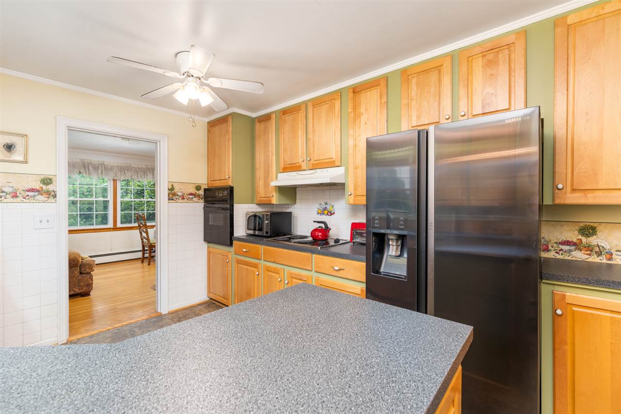235 Overlook Road Staunton, VA 24401 - Photo 8 of 37 a kitchen with stainless steel appliances granite countertop a refrigerator and a sink