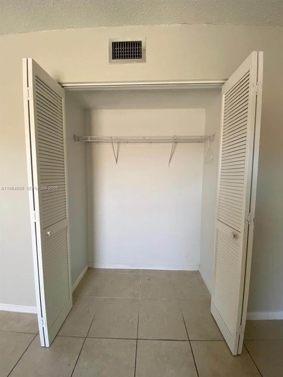 7440 Southwest 153rd Court, Unit 2014 Miami, FL 33193 - Photo 16 of 25 a view of a room with an empty space