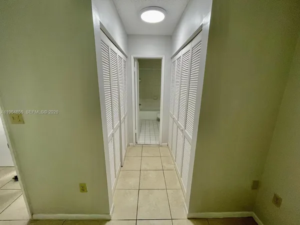 a view of wooden closet area