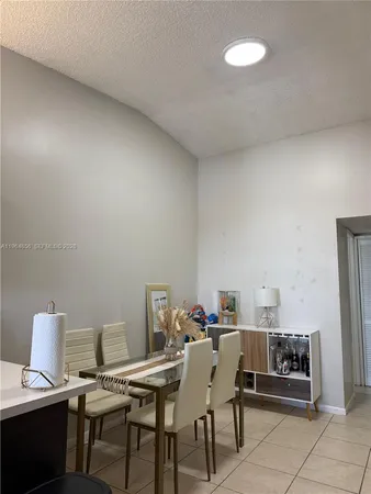 a view of a workspace with furniture