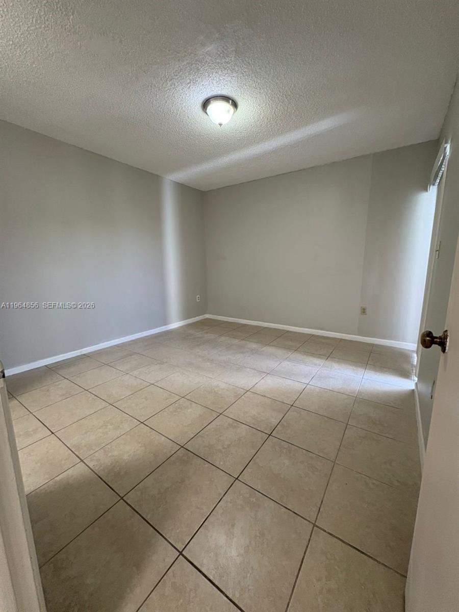 7440 Southwest 153rd Court, Unit 2014 Miami, FL 33193 - Photo 10 of 25 a view of an empty room
